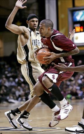 Gary Forbes tries to make a move on Shan Foster