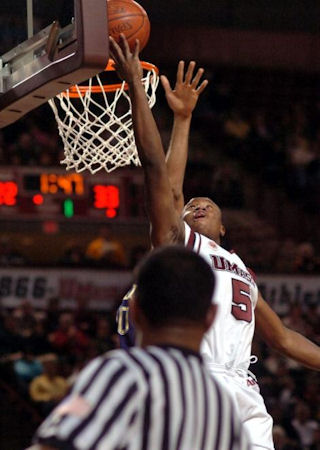 Ricky Harris reverses the layup