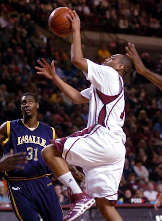 Chris Lowe goes up for the shot