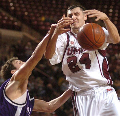 Tony Gaffney gets hacked by the Crusaders' Andrew Beinert