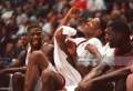 ALBANY, NY - MARCH 19: UMass Amherst's Marcus Camby and teammate Lou Roe
celebrate on the bench during a game in the NCAA Tournament against Stanford
University in Albany, NY on on March 19, 1995. (Photo by Jim Davis/The Boston...