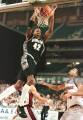 23 Mar 1996: Jerome Williams #42 of the Georgetown Hoyas slams the ball home
over Carmelo Travieso #24 of the UMass Minutemen during the first half of the
Hoyas 86-62 NCAA East Regional Championship loss to the Minutemen at Georgia...