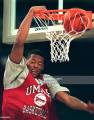 PROVIDENCE, RI - MARCH 13: UMass Amherst's Marcus Camby slams home a dunk during
a final workout at the Civic Center in Providence, RI on on March 13, 1996....