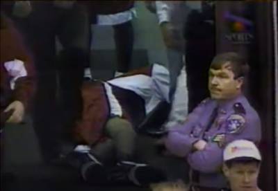 Marcus Camby lies motionless after collapsing.